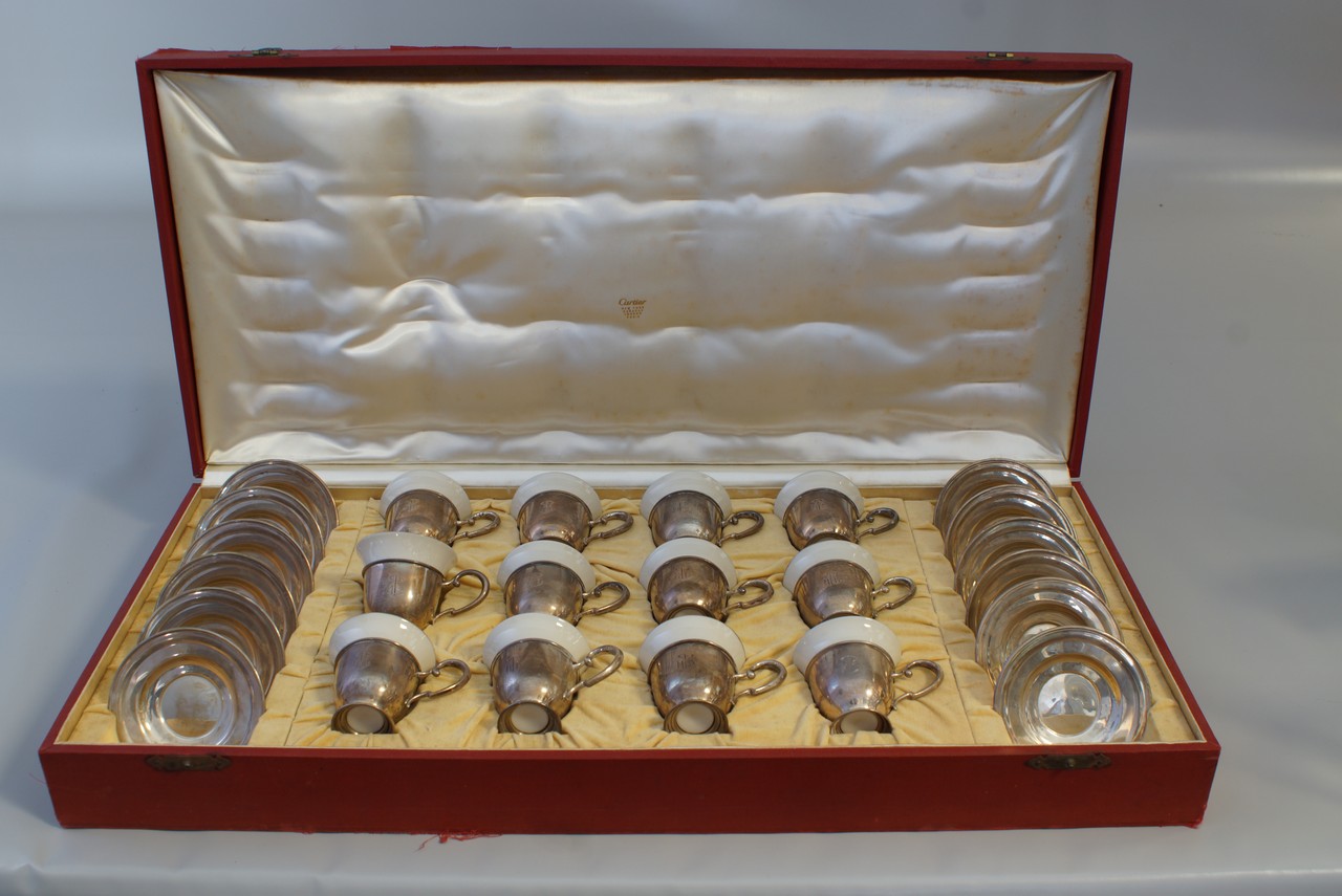 Appraisal: Cased set sterling silver demitasses cups and saucers with unmarked