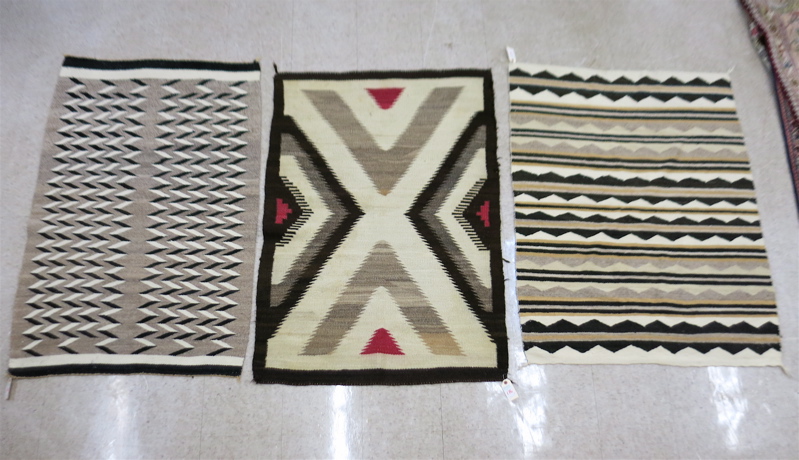 Appraisal: THREE NAVAJO WEAVINGS X inch repeating stripe x inch repeating