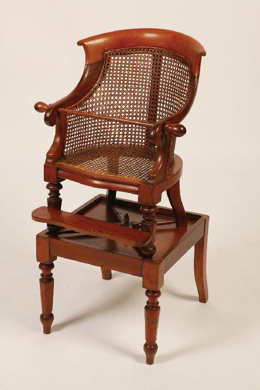 Appraisal: A REGENCY MAHOGANY HIGH CHAIR the shaped back with scrolling