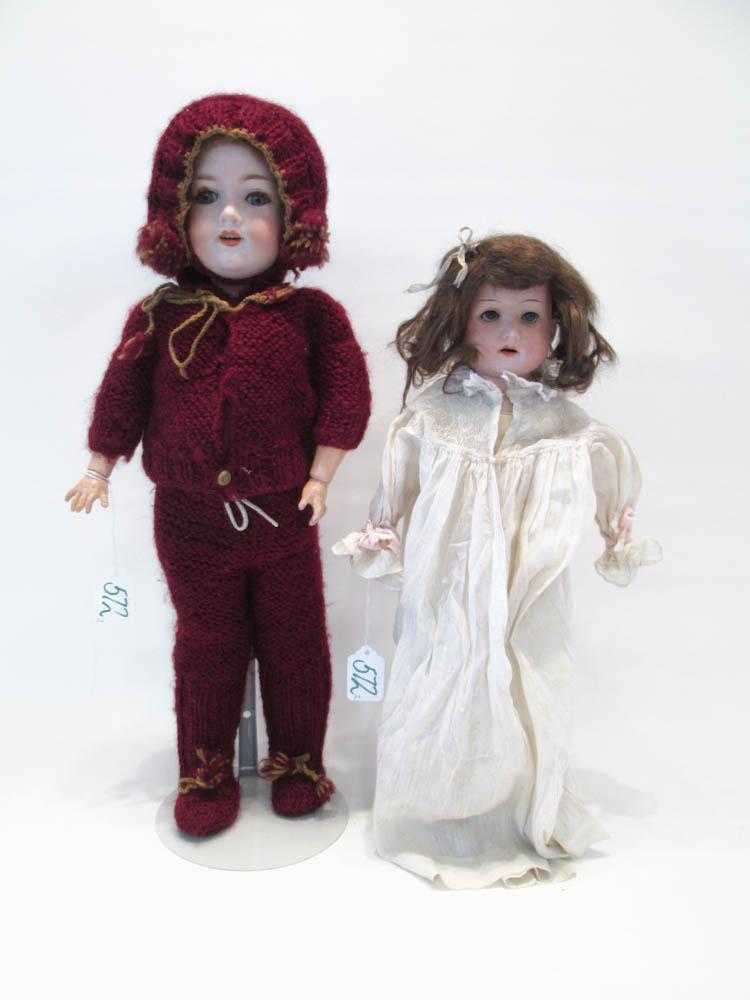 Appraisal: TWO GERMAN BISQUE HEAD DOLLS by Armand Marseilles strawberry blond