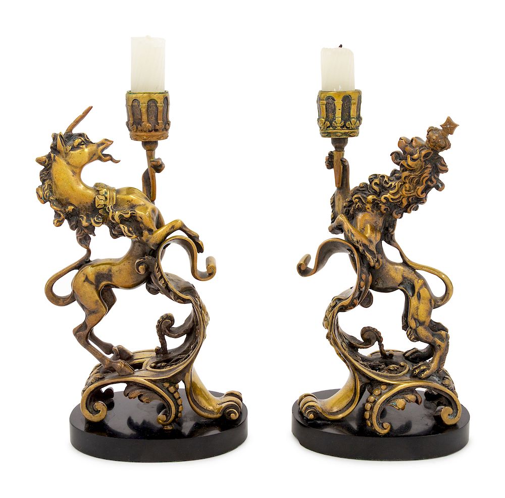 Appraisal: A Pair of Continental Bronze Figural Candlesticks A Pair of