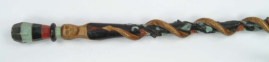 Appraisal: CANE OUTSTANDING FOLK ART CARVED AND PAINTED SNAKE CANE Black