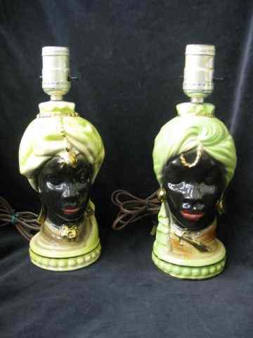 Appraisal: Pottery Figural Blackamoor Lamps '' tall body excellent