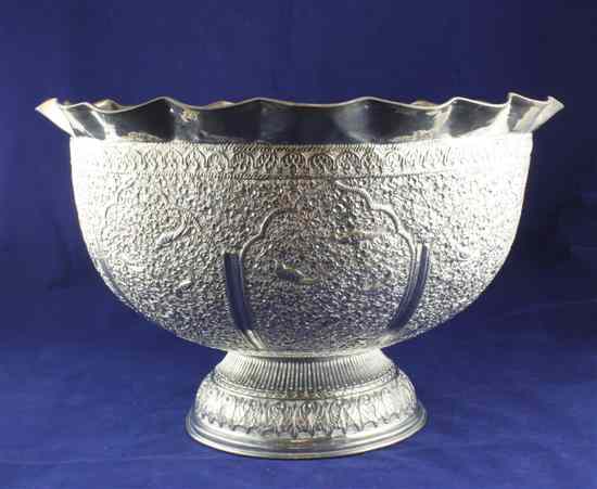 Appraisal: An Indian white metal jardinere of circular form with wavy