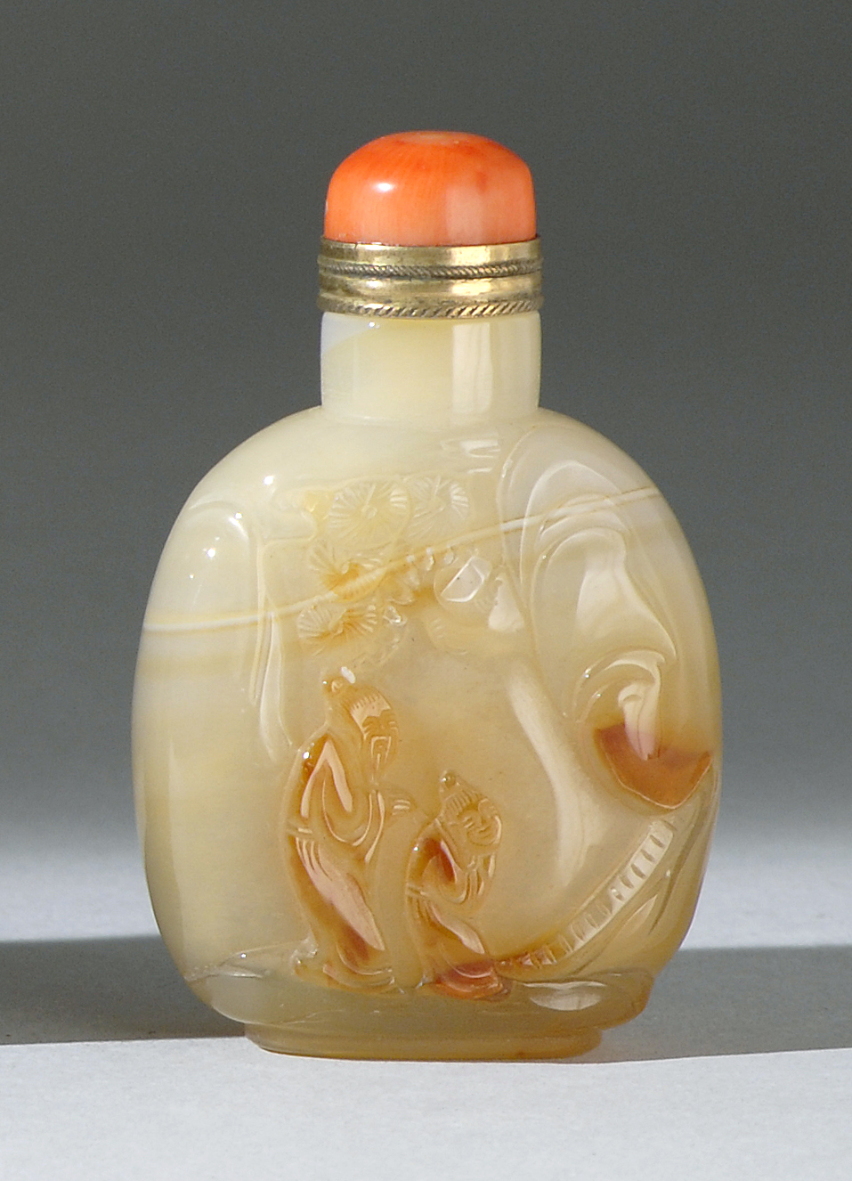 Appraisal: CHALCEDONY AGATE SNUFF BOTTLE In flattened ovoid form with relief