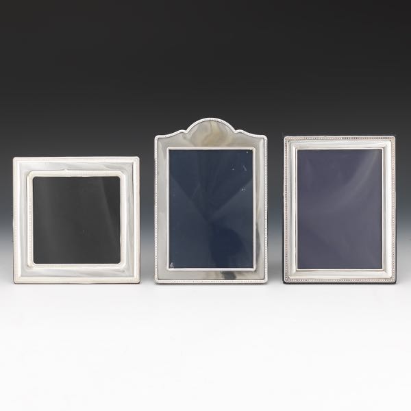 Appraisal: Three Sterling Silver Frames Sheffield sterling frame by Carr's of