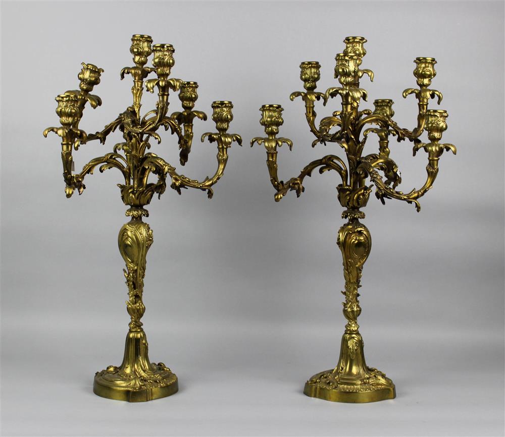 Appraisal: PAIR OF LOUIS XV BRONZE SEVEN LIGHT CANDELABRA late th