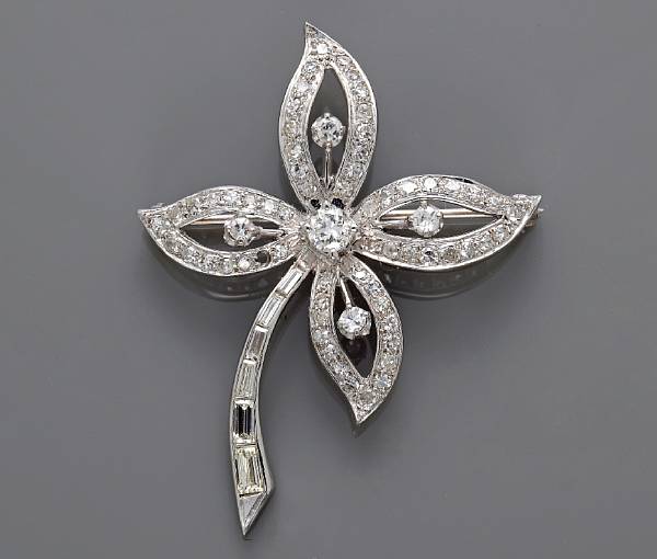 Appraisal: A diamond flower brooch estimated total diamond weight carats mounted