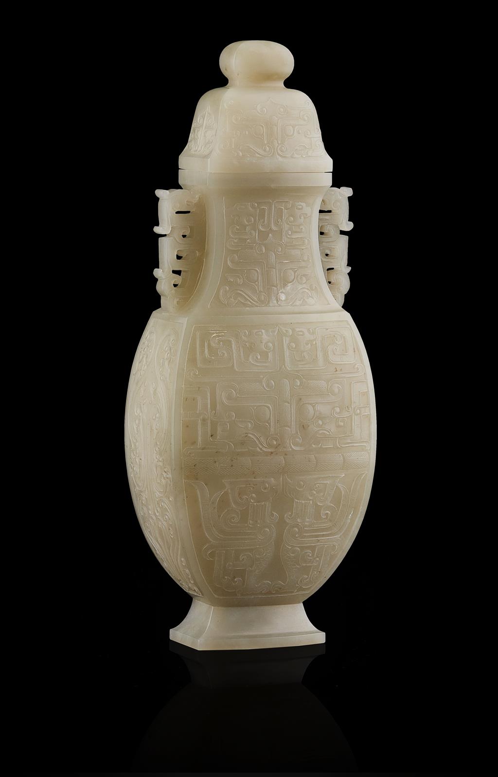 Appraisal: WHITE JADE VASE AND COVER of baluster shape and with