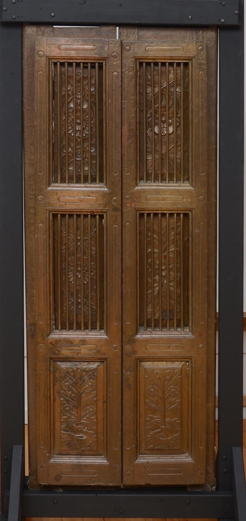 Appraisal: Pair of Indian Metal-Mounted Doors Now mounted on frames for