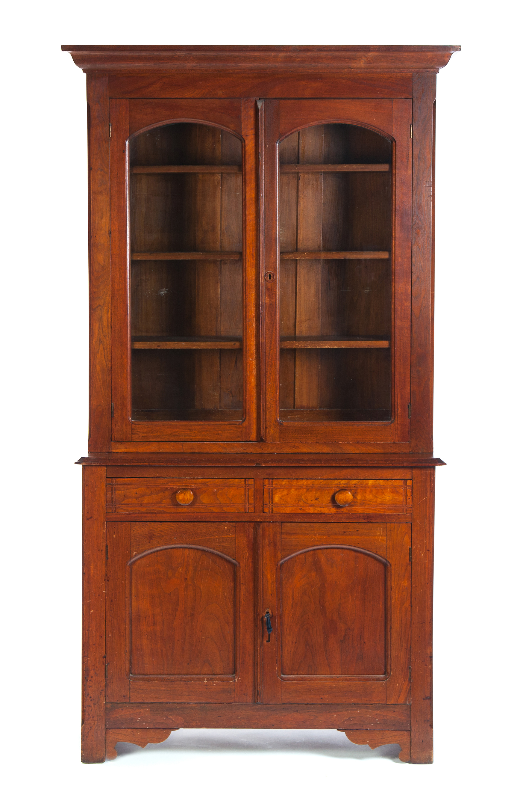 Appraisal: EASTLAKE VICTORIAN TWO-PIECE CUPBOARD American th quarter- th century walnut