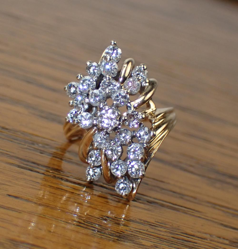 Appraisal: DIAMOND AND FOURTEEN KARAT GOLD CLUSTER RING set with round