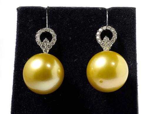 Appraisal: PEARL AND BRILLIANT-CUT DIAMOND STUD EARRINGS White gold Attractive stud