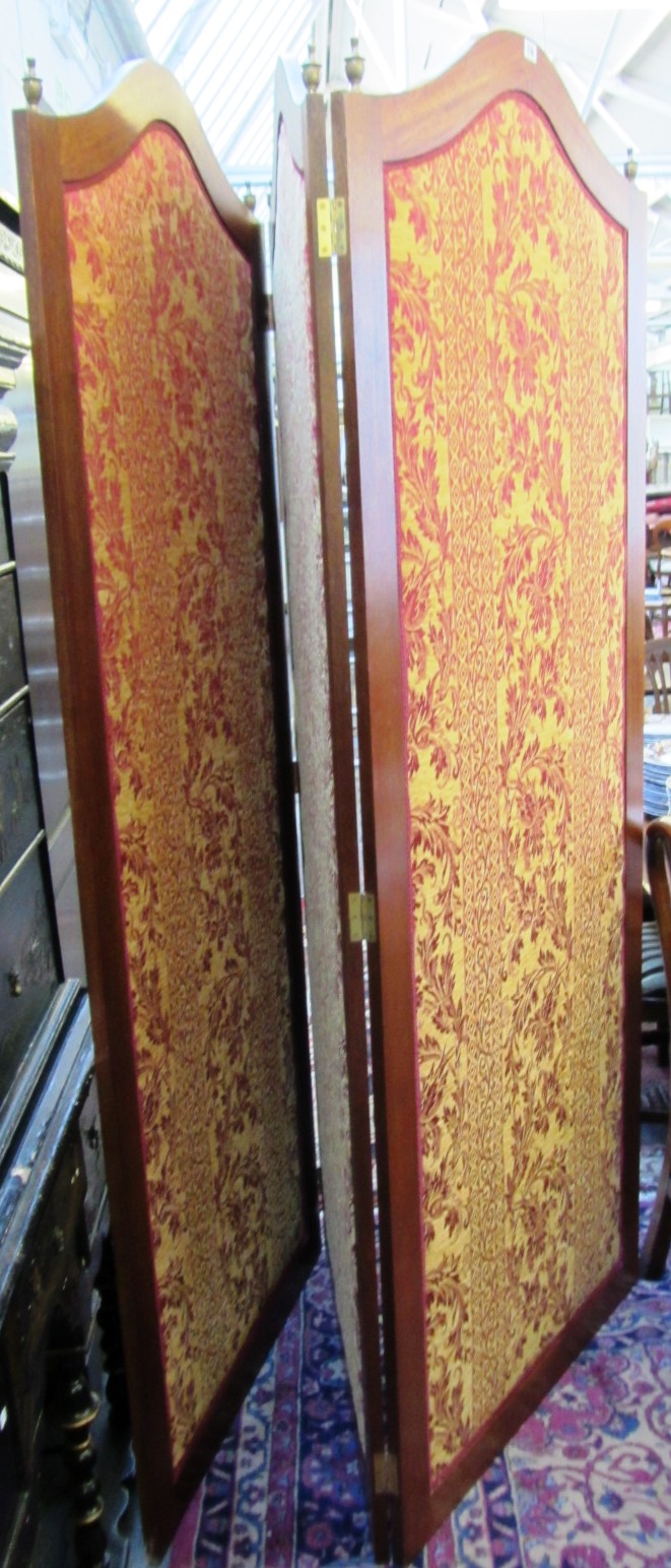 Appraisal: A large th century mahogany arched top three fold screen