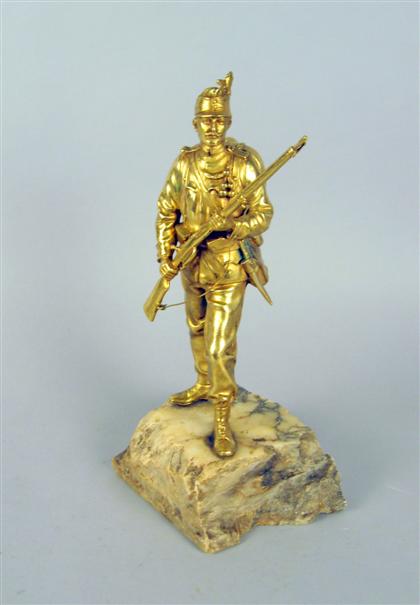 Appraisal: French gilt bronze figure of a soldier Mounted on a