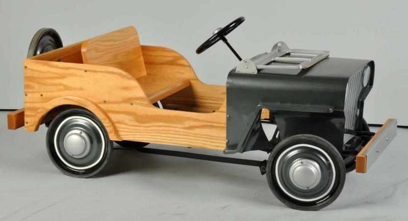 Appraisal: Pressed Steel Steiger Woody Jeep Pedal Toy Description s Professional