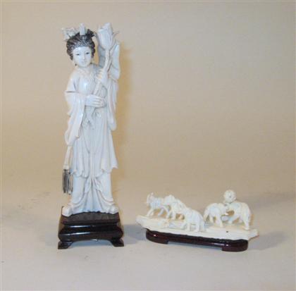 Appraisal: Chinese elephant ivory figure and groupingComprising a tall female beauty