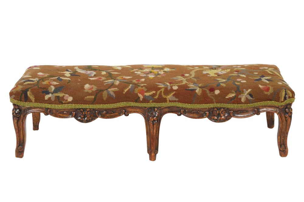 Appraisal: LOUIS XV PROVINCIAL STYLE FRUITWOOD FOOTSTOOLcovered with bird-motif needlepoint inches