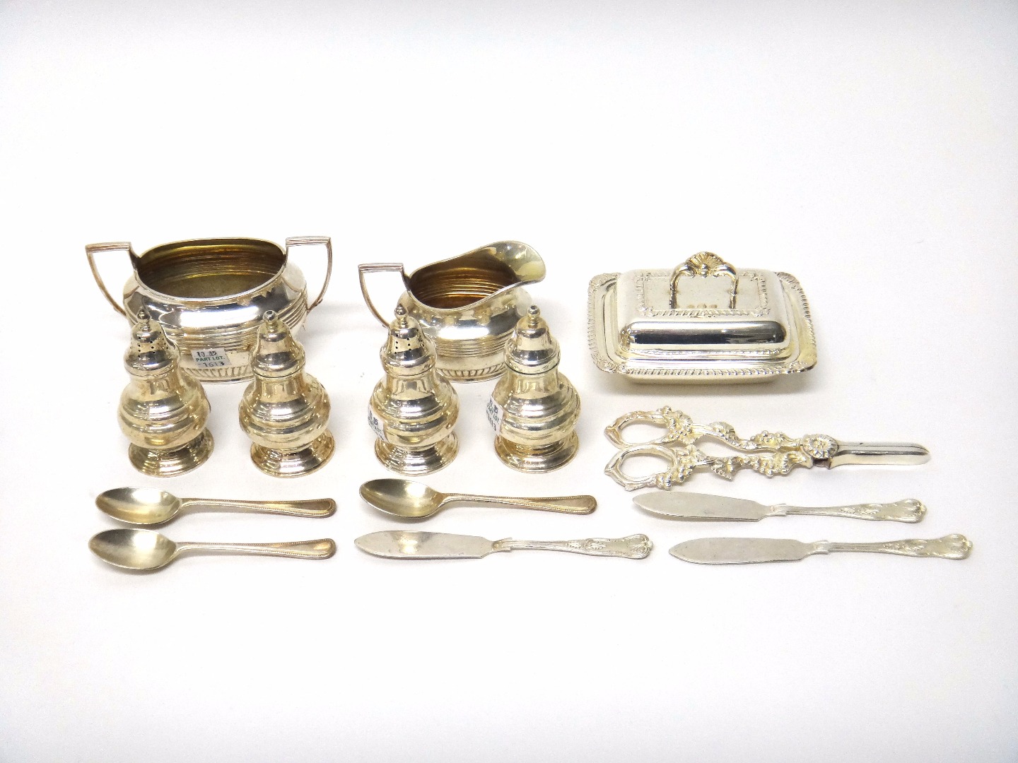 Appraisal: Three silver Kings pattern butter knives plated wares comprising a