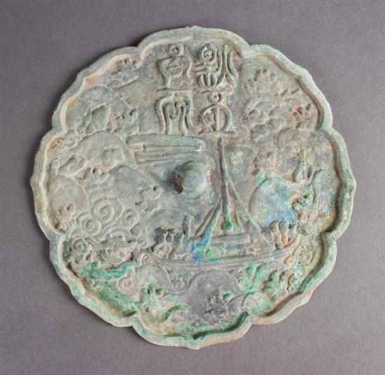 Appraisal: Chinese Tang-style bronze mirror the back with molded scene of