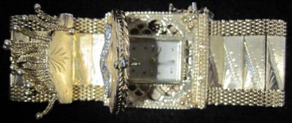 Appraisal: Lady's karat yellow gold diamond 'retro' wristwatch Rectangular covered white