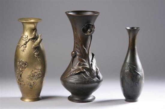 Appraisal: THREE JAPANESE BRONZE AND BRASS VASES Meiji period Crane lotus