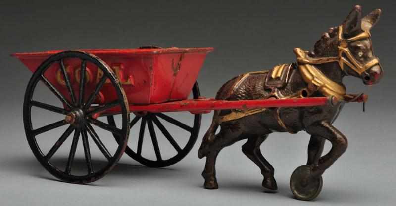 Appraisal: Cast Iron Ives Coal Wagon Donkey-Drawn Toy Description American Small