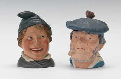 Appraisal: Two Stylized Humidor Heads Including Smiling Youth and French Sailor