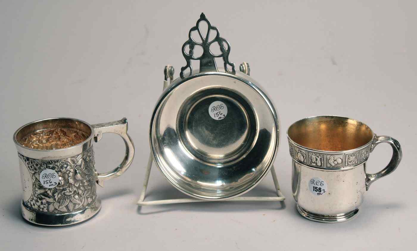 Appraisal: THREE STERLING SILVER CHILDREN'S PIECESA cup with repouss floral decoration