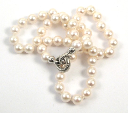 Appraisal: PEARL AND EIGHTEEN KARAT GOLD NECKLACE - in length and