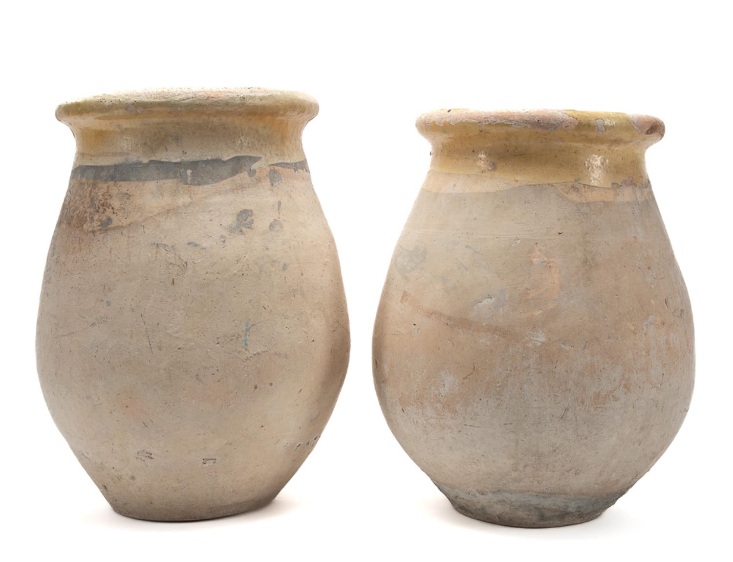 Appraisal: PAIR YELLOW PARTIAL GLAZED EARTHENWARE BIOT JARS French late th