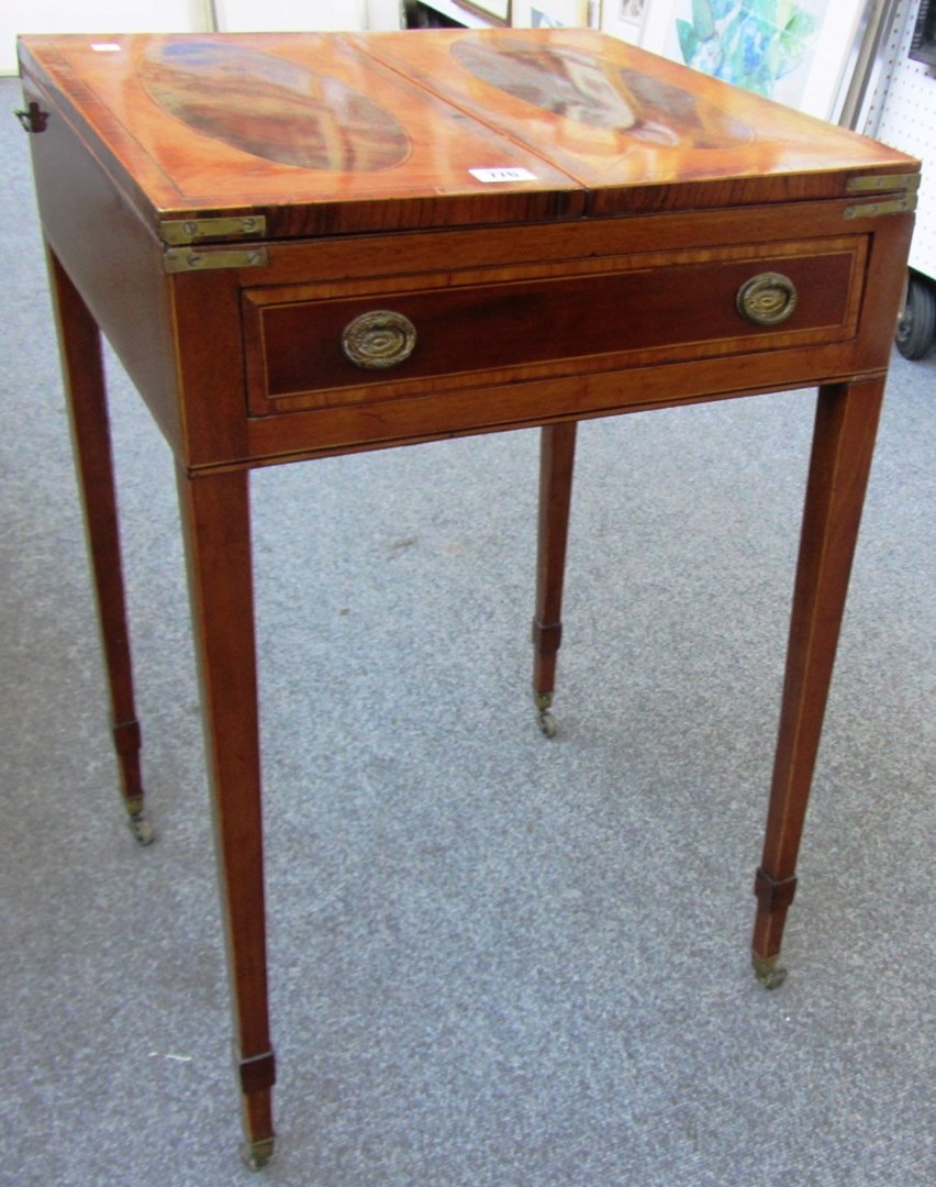 Appraisal: A th century mahogany and satinwood writing table the fold