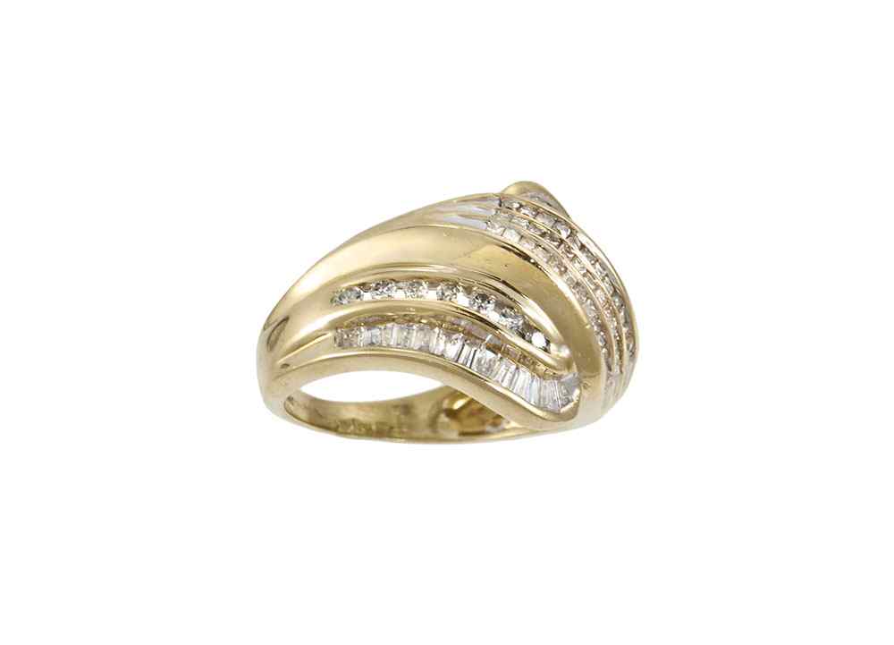 Appraisal: CTW CHANNEL SET DIAMOND RING K yellow gold ring contains