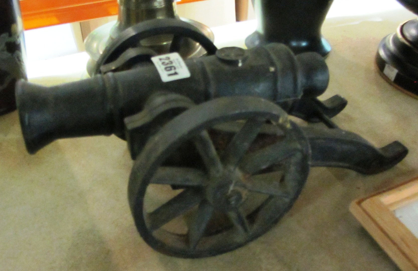 Appraisal: A th century cast iron model of a cannon