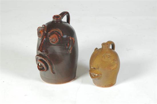 Appraisal: TWO GROTESQUE JUGS Made by Brown's Pottery Arden North Carolina