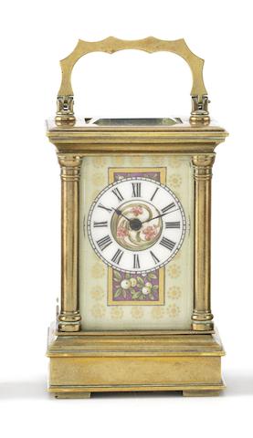 Appraisal: A late th century French brass carriage timepiece with ceramic