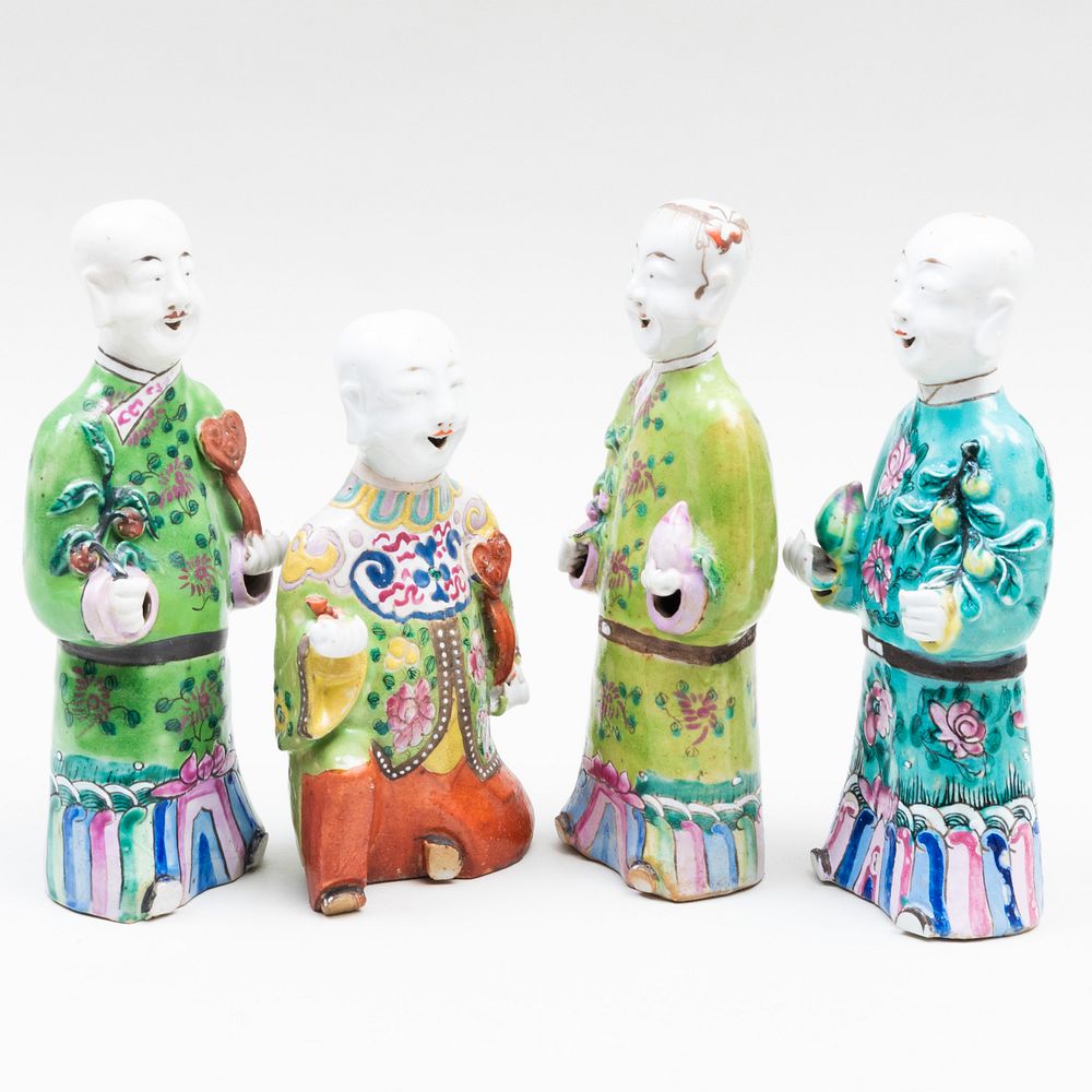 Appraisal: Four Chinese Export Porcelain Figures of Boys Each bearing auspicious