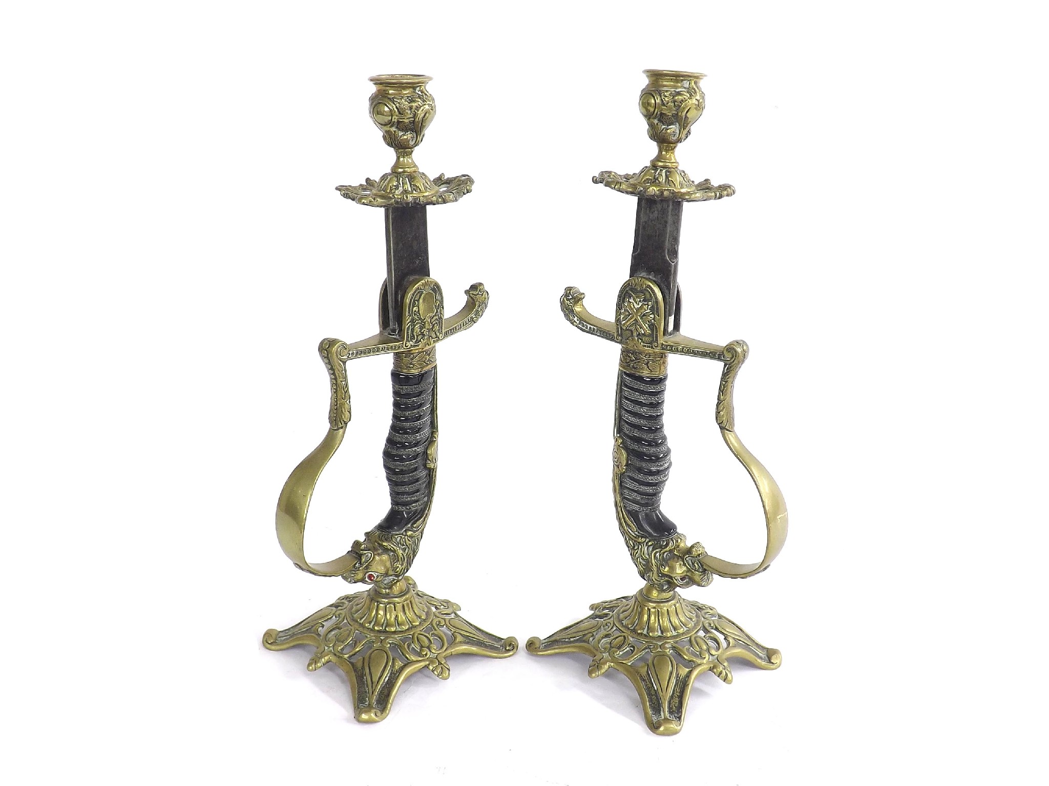 Appraisal: Interesting pair of novelty candlesticks composed from officer sword hilts