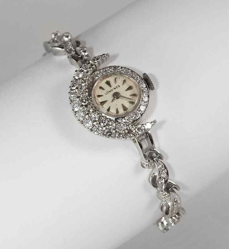 Appraisal: UNUSUAL LONGINES DIAMOND CRESCENT MOON DRESS WATCH K white gold