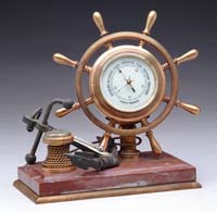 Appraisal: INTERESTING NAUTICAL MOTIF BAROMETER THERMOMETER COMPASS The aneroid circular barometer