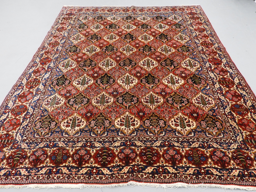 Appraisal: ANTIQUE BAKHTIARI PICTORIAL CARPET RUG PersiaCirca Repeating ivory and red