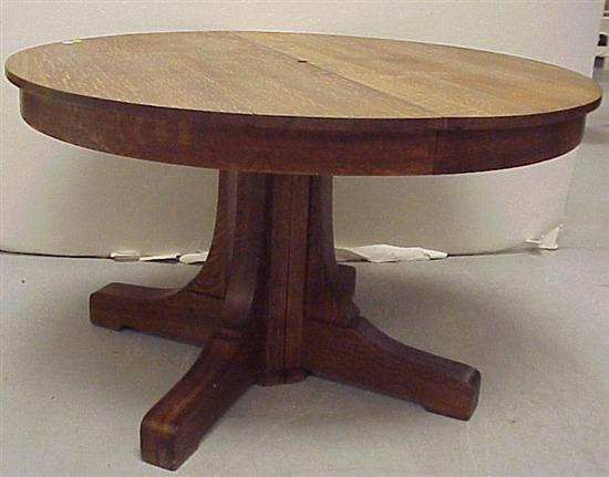 Appraisal: Oak dining table c round top octagonal pedestal base with