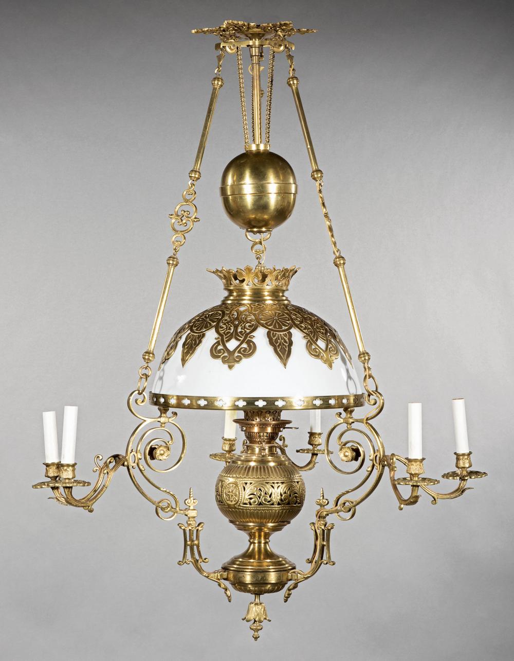 Appraisal: American Brass Seven-Light Chandelier th c central oil lamp and