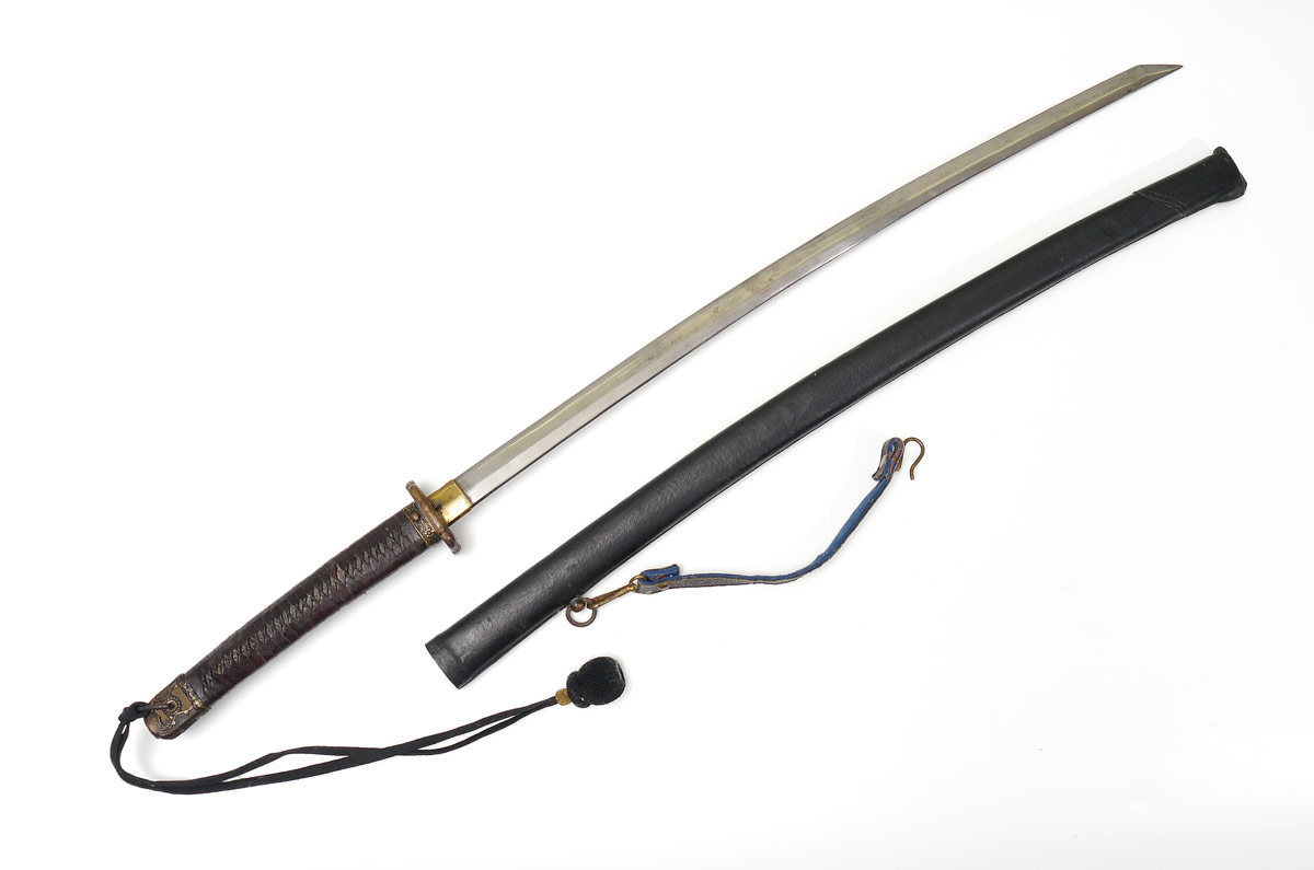 Appraisal: UNUSUALLY LONG WWII JAPANESE MILITARY KATANA SWORD With NCO shin