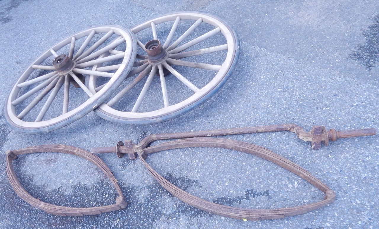 Appraisal: A pair of ash cartwheels with rubber tyres axle and