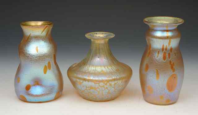 Appraisal: A miniature Loetz iridescent glass vase in the Astraa decoration