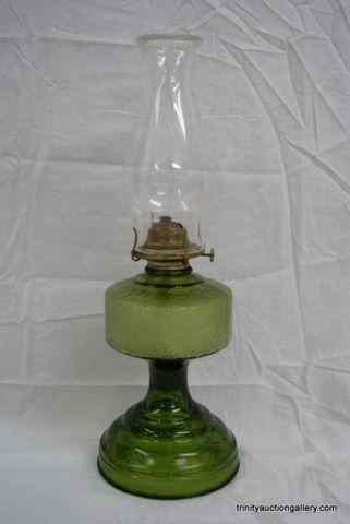 Appraisal: Vintage Green Flashed Pressed Glass Oil LampFrom the estate is