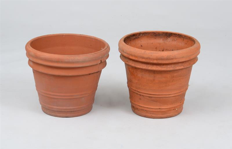 Appraisal: TWO SIMILAR TERRACOTTA PLANTERS Each of conical tapering form one