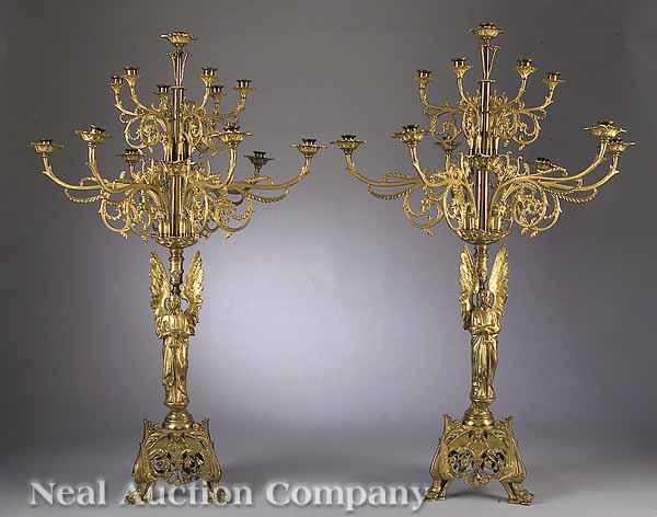 Appraisal: A Pair of Monumental Patinated and Gilt-Brass Thirteen-Light Figural Candelabra