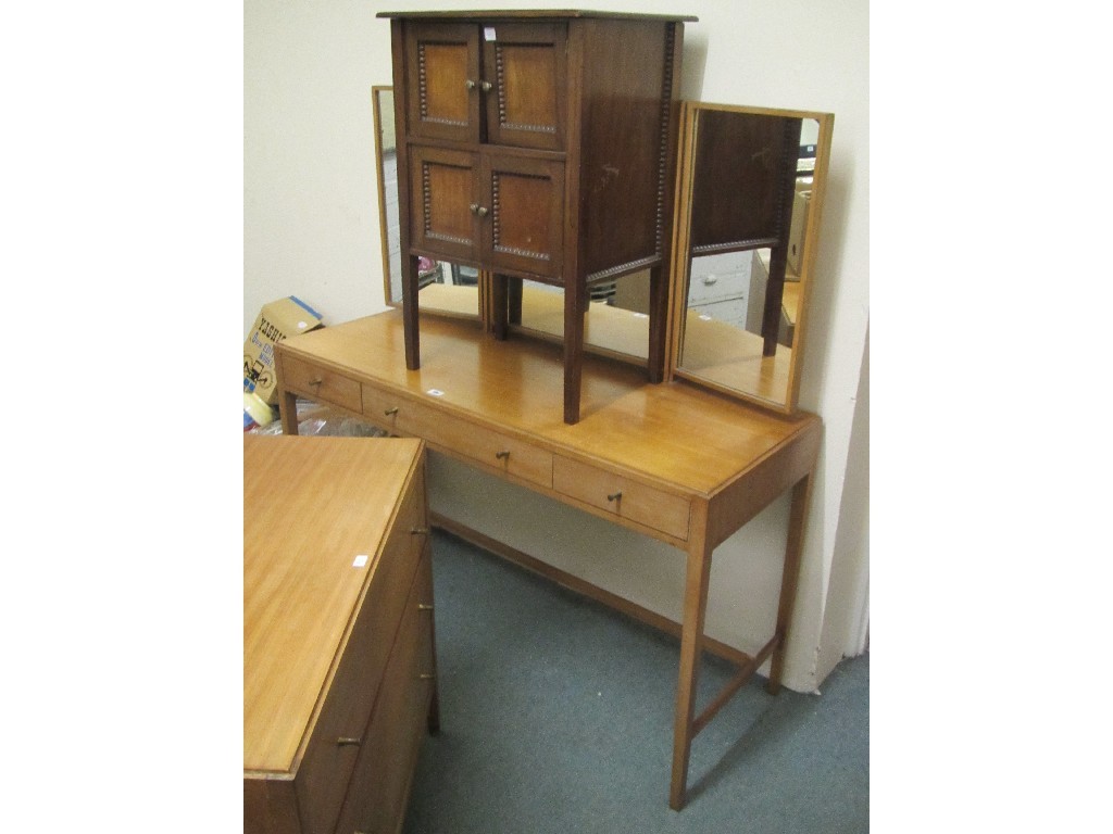 Appraisal: Three piece bedroom suite and a sewing cabinet